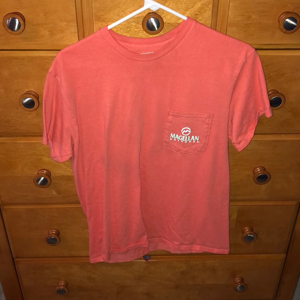 A pink Magellan shirt.